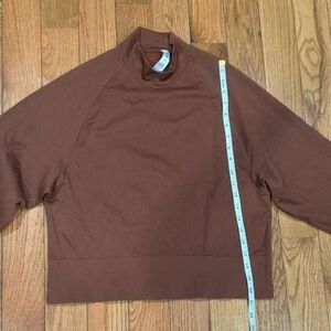 lululemon athletica Women's Turtleneck Sweater in Rich Brown.